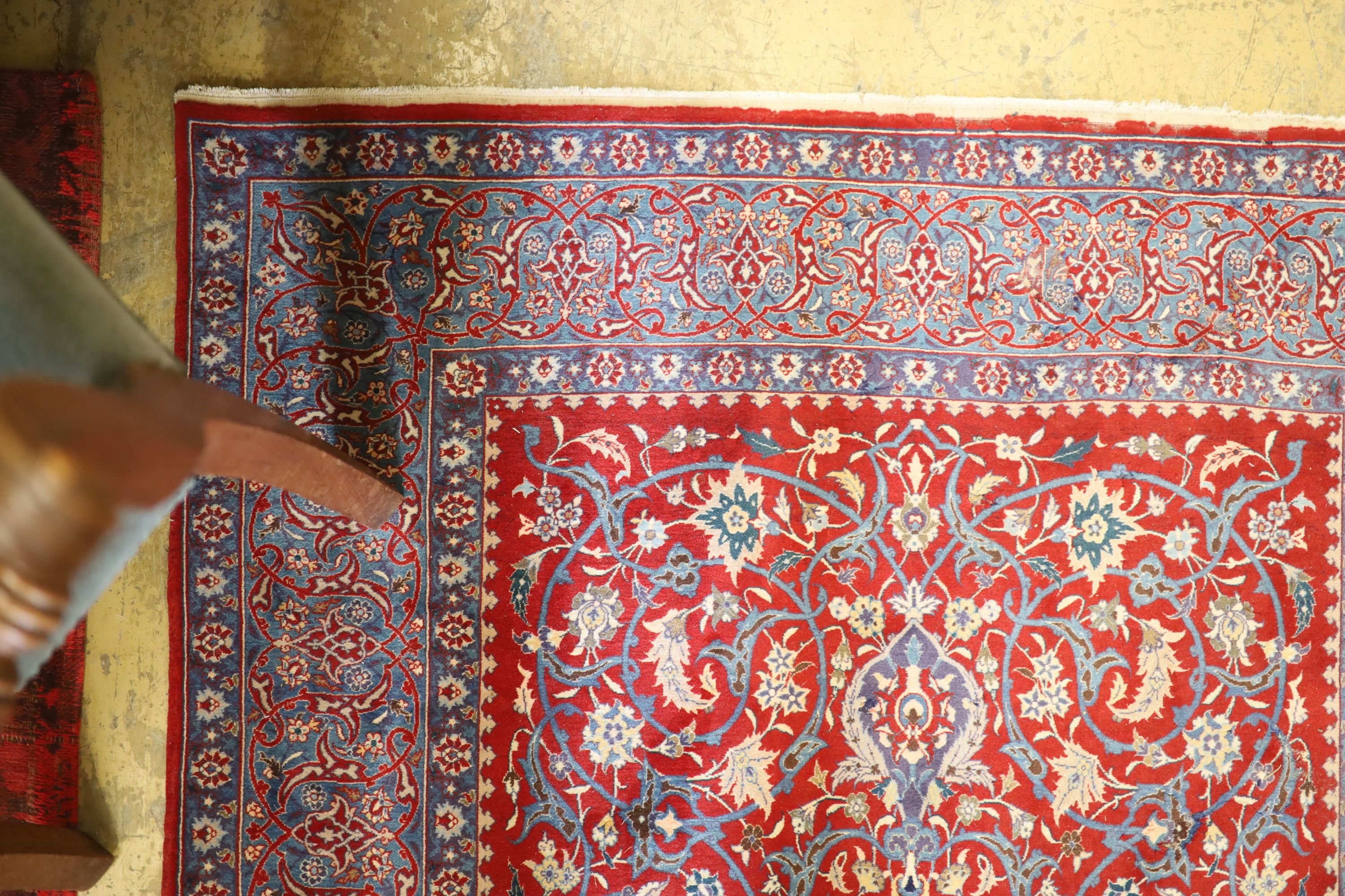 An Isfahan red ground rug, 169 x 110cm